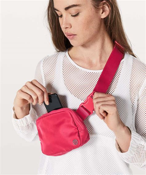 bright pink lululemon belt bag